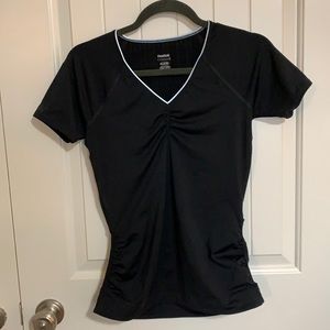 Black. Reebok. Play Dry women’s top. Be neck. Gathered sides. Vented back